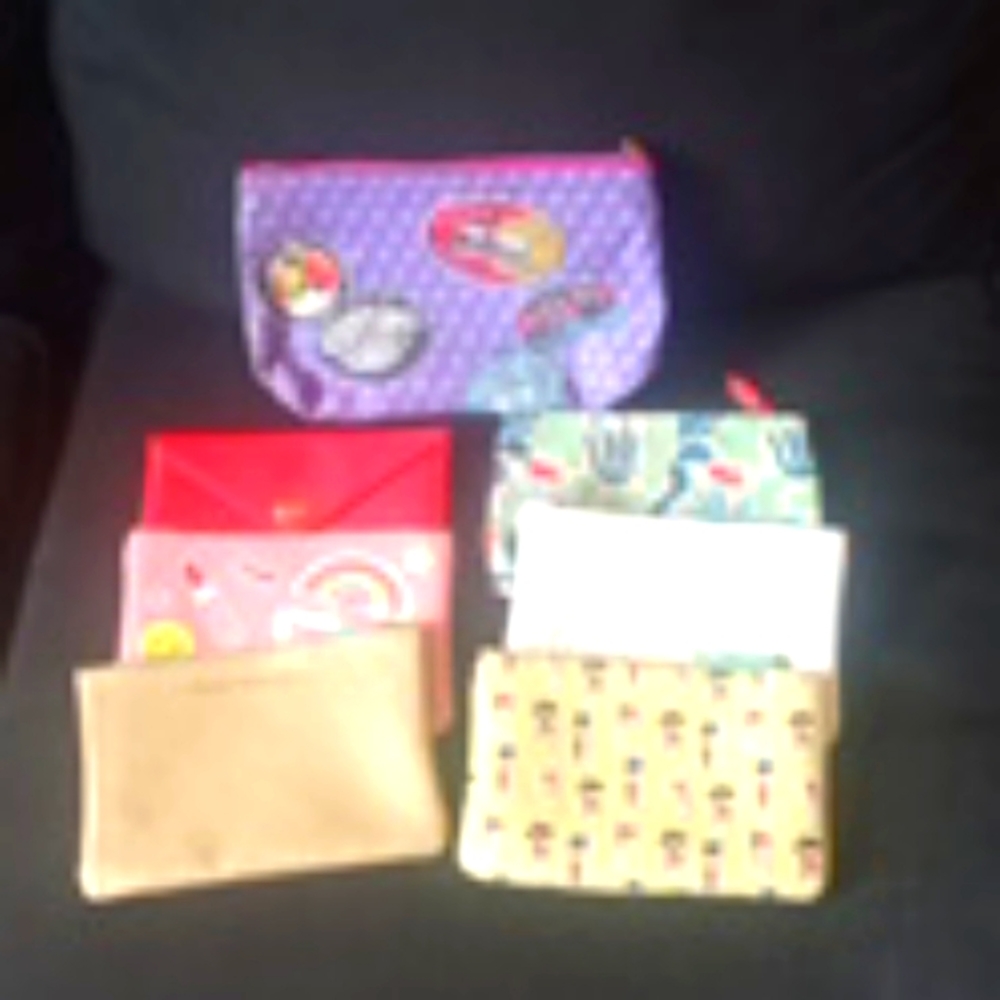 7 small makeup bags one medium